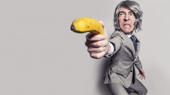 businessman-aiming-with-banana (1)
